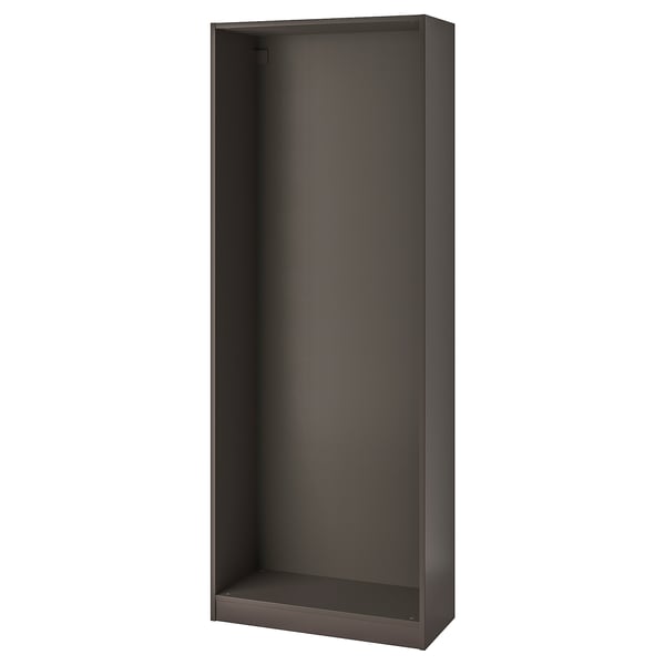 An empty, dark brown PAX wardrobe frame by IKEA. It is tall and rectangular, made from recycled paper and particleboard.