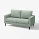 Modern mint green loveseat with sleek legs, plush cushions, and minimalist design.
