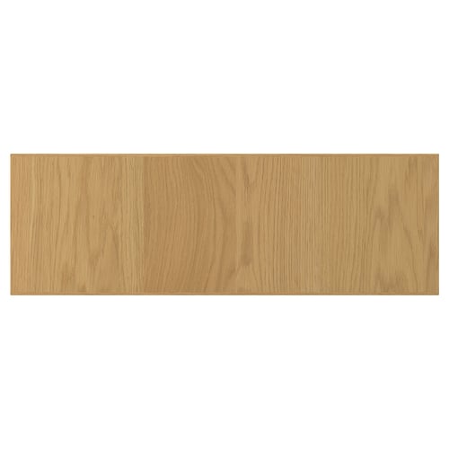 A light wooden panel with grain details.