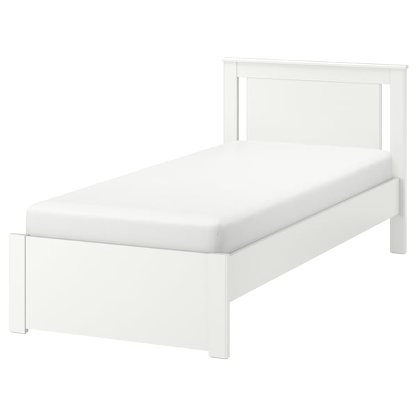 White SONGESAND bed with clean lines and high legs. Made of particleboard and fiberboard.