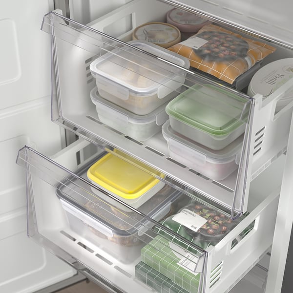 Open refrigerator showing organised drawers with meal prep containers and food, featuring no-frost and quick freeze functions.