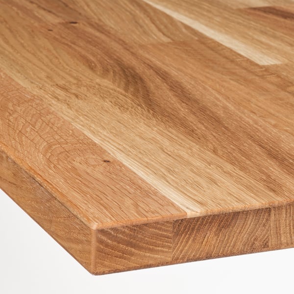 Close-up of smooth, polished wooden surface, showcasing natural grain texture and warm, honey-toned finish.