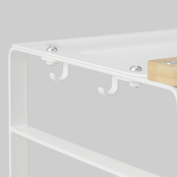 White metal shelf with hooks. Quality design, white finish, sturdy construction. Knife holder and hooks for storage.