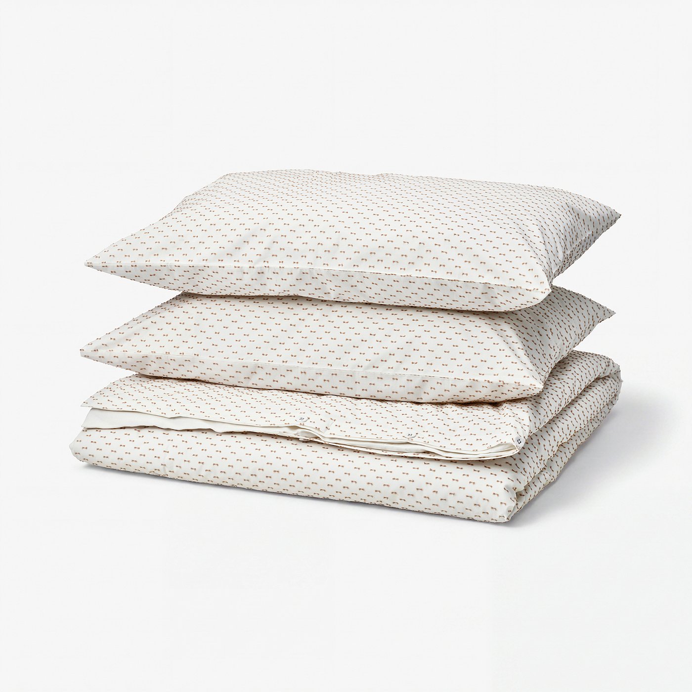 BANDKNIPPE: white & beige cotton duvet set with dotted texture, neatly folded in a stack.