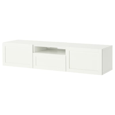 Modern white BESTÅ tv stand. Two doors, central open section, and adjustable feet. Sleek, rectangular design for clean look.