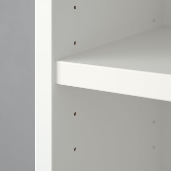 White BILLY bookshelf with adjustable shelves. Simple, modern design. Three visible screws.