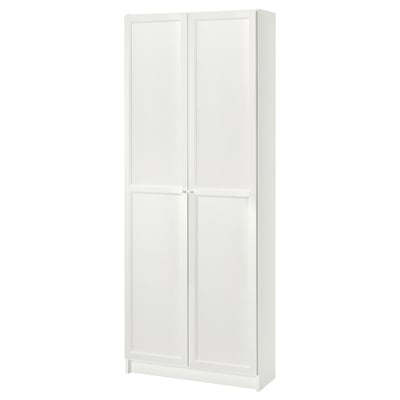 IKEAs BILLY white bookcase, rectangular, with two panel doors, simple design.