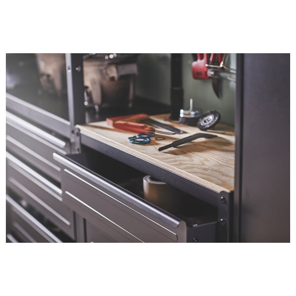 BROR workbench with pine top, open drawers, tools inside.
