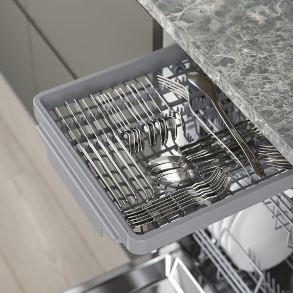 Open dishwasher with cutlery in utensil holder, showing organised compartments.