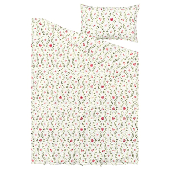 A white FYRISVIDE duvet set with red and green floral designs on cotton. A duvet and matching pillowcase, showcasing a vintage-inspired pattern.