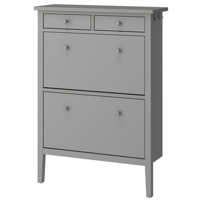A grey GULLABERG shoe cabinet with drawers, featuring a traditional design with crafted details and wooden knobs.