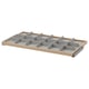 An IKEA KOMPLEMENT light grey wood drawer organiser with multiple compartments.