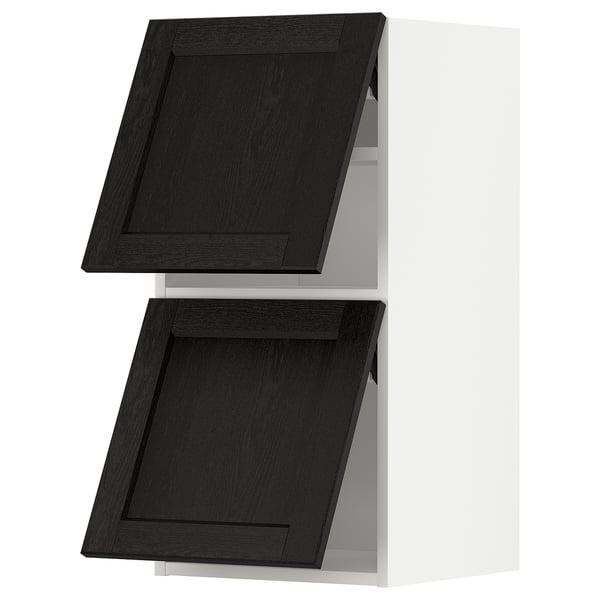 A black stained wooden cabinet with two doors from the METOD kitchen system, featuring a traditional design with bevelled edges.