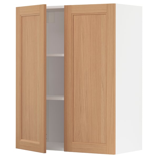 Oak METOD wall cabinet, natural wood look, two doors open, adjustable shelf.