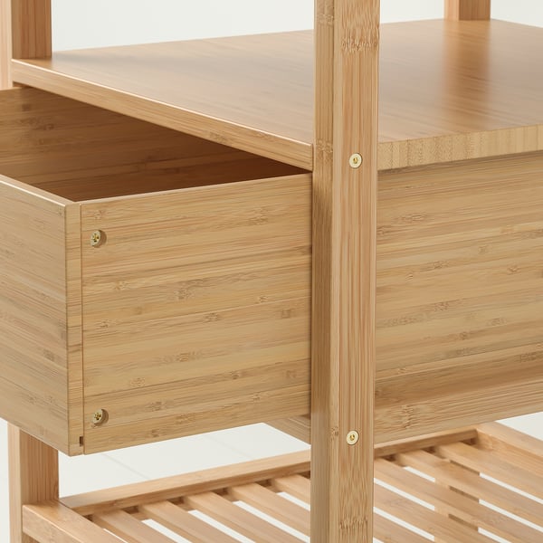 Bamboo drawer unit, showing open drawer and golden handles. High-quality, natural finish with sturdy construction.