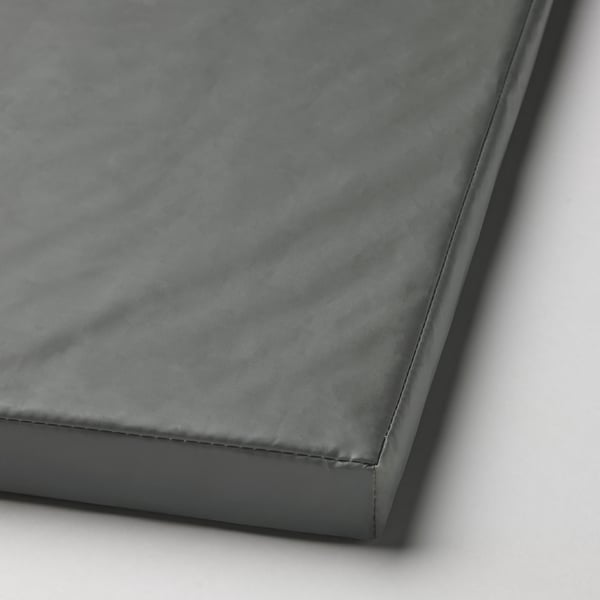 Foldable gym mat in dark grey with smooth, padded surface and secure stitching.