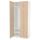 An ikea PAX wardrobe in white and light wood, open and empty.