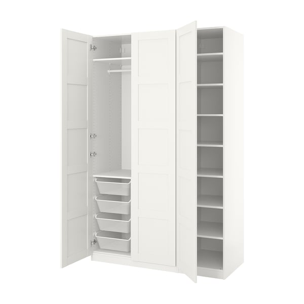 White PAX wardrobe, open revealing mesh baskets and shelves. Simple, modern design with white texture.