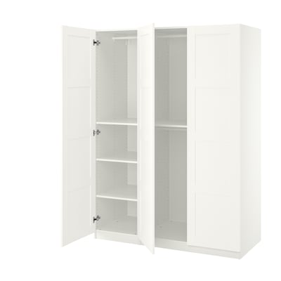 White ikea PAX wardrobe, tall & rectangular, with open doors showcasing multiple shelves.