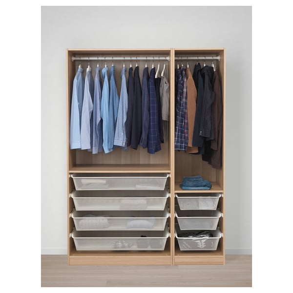 Wooden closet with hanging shirts, jackets, and mesh drawers for folded clothes.