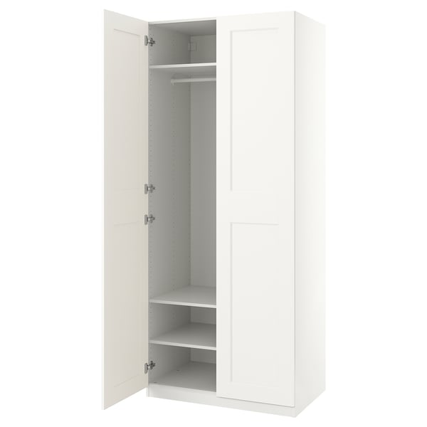 White PAX wardrobe, slim, soft-closing doors, adjustable feet, shelves inside.