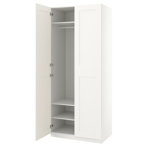 White PAX wardrobe, slim, soft-closing doors, adjustable feet, shelves inside.