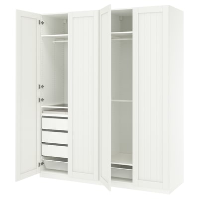 A white PAX wardrobe set with open doors, featuring shelves and drawers. Its made of particleboard and fiberboard, designed for efficient storage.