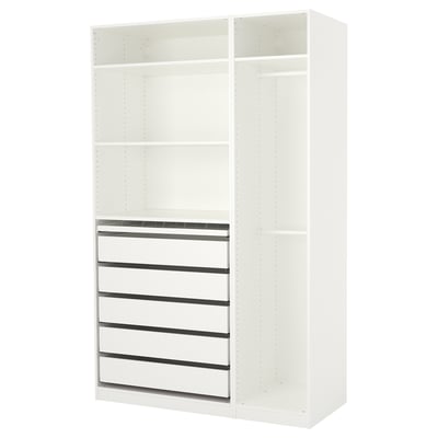 A white IKEA PAX wardrobe with adjustable shelves and pull-out drawers for organised storage.