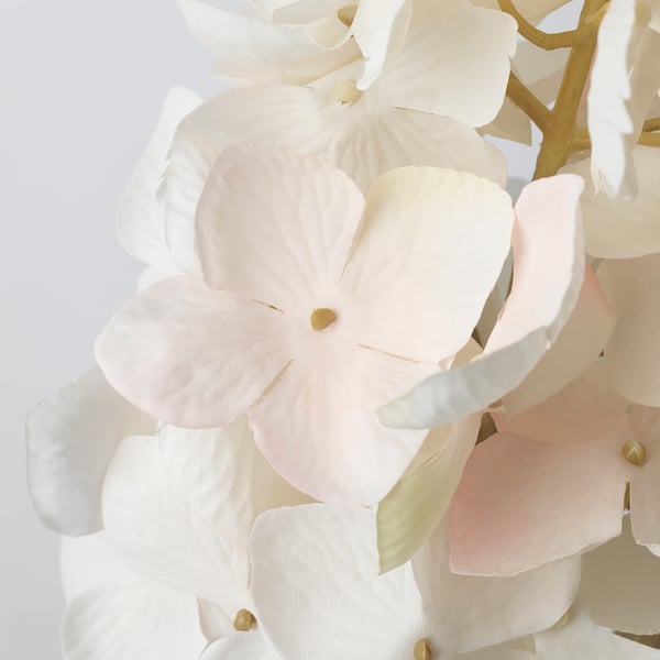 Artificial flowers, white & pink, realistic shades, natural arrangement.