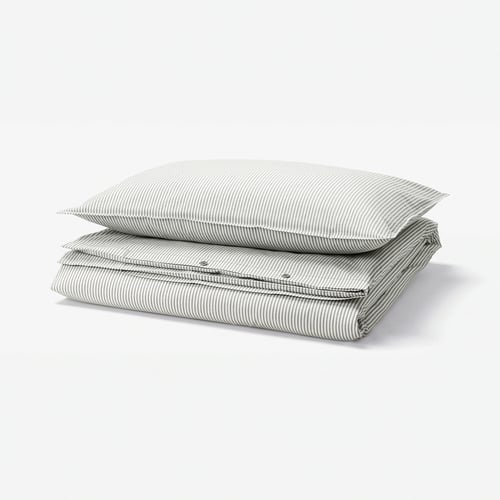 Stack of grey and white striped SOLFIBBLA cotton duvet cover set, folded neatly.
