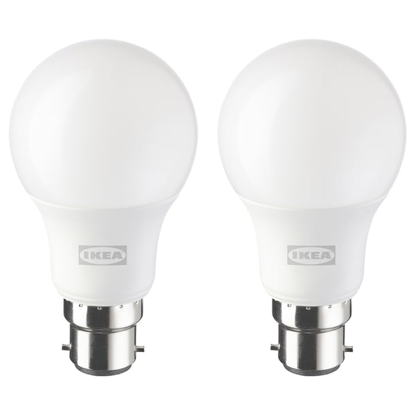 Two white ikea led light bulbs with silver bases, round shape, frosted design.