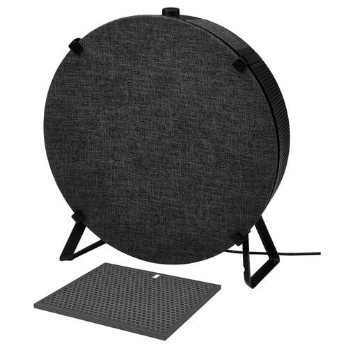Black circular air purifier on metal stand, with a textured fabric cover, designed for indoor use, controlling air quality efficiently.