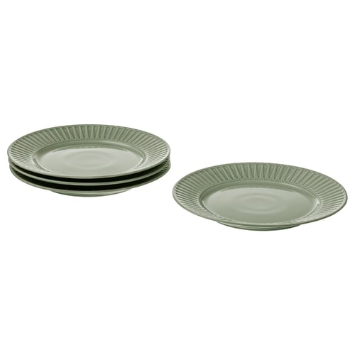 Four green plates, two stacked and two separate, with ridged edges and a smooth centre. Made of stoneware, simple and elegant.