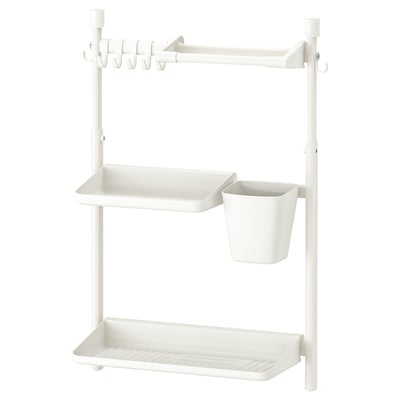 A white SUNNERSTA organiser with multiple shelves, hooks, and a hanging container made of plastic and steel.