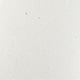 Smooth, sleek wall panel of recycled glass; subtle speckles, durable, non-porous.