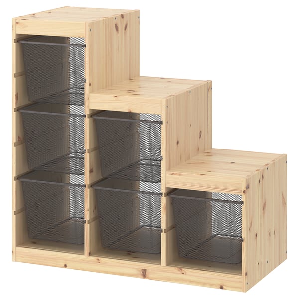 Displays an ikea TROFAST storage unit, light wood, cubic, multi-tiered design with mesh containers.