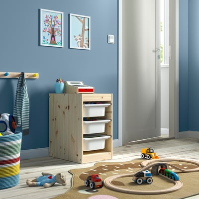 TROFAST toy storage in kids playroom with art & train.