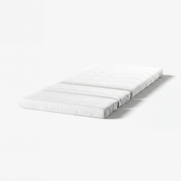White mattress, egg-shaped pattern, medium-firm, recycled materials, folds for growth.