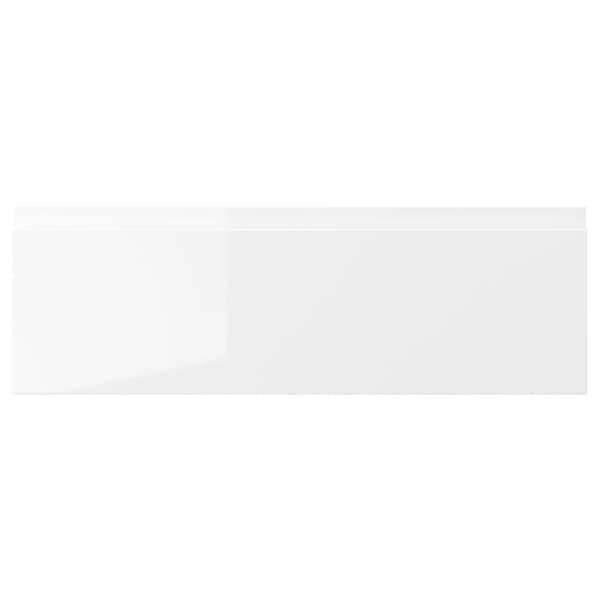 VOXTORP white high-gloss drawer front, sleek modern design with integrated handles, smooth fiberboard surface.