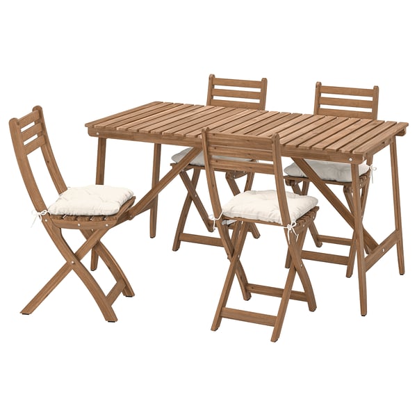 Wooden outdoor table and four foldable chairs, light brown, with cushions.