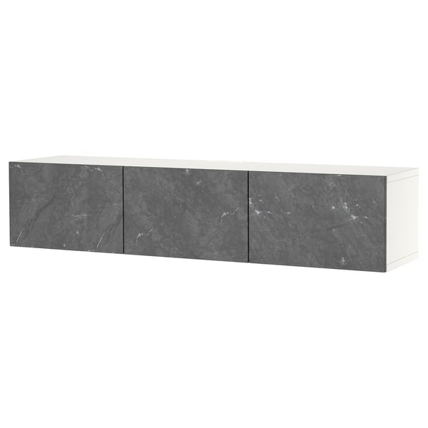 A white BESTÅ tv bench with grey marble-effect doors, featuring soft-close hinges and cable management.