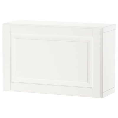 BESTÅ white wall cabinet, rectangular shape, minimalist design, with one shelf, made of particleboard, fiberboard, and acrylic paint.