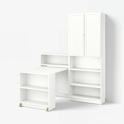A white BILLY bookcase with a foldable table, combining open and closed storage. It adjustable shelves and a pull-out table for flexibility in use.