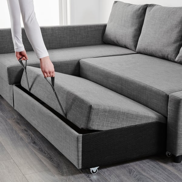 Adjusting sofa bed, shows storage.