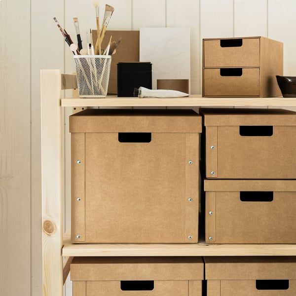 GÄRDESGÅRD storage boxes in brown cardboard, sturdy and handled, stacked neatly. Fit various items and easy to carry.