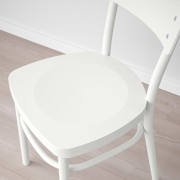 Modern white chair, smooth rounded seat, sturdy wooden legs, clean minimalist design.