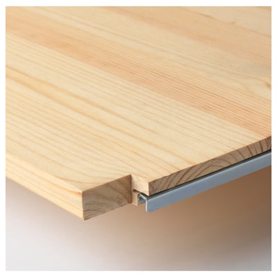 Close-up of a wooden shelf edge, showcasing its smooth, light-colored wood grain and robust construction.