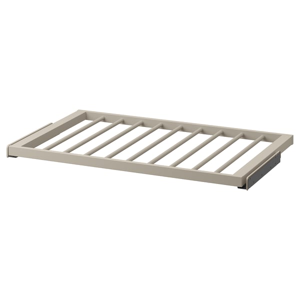 KOMPLEMENT trouser hanger in beige, modern design with slatted structure, sturdy steel frame, smooth surface for easy access.