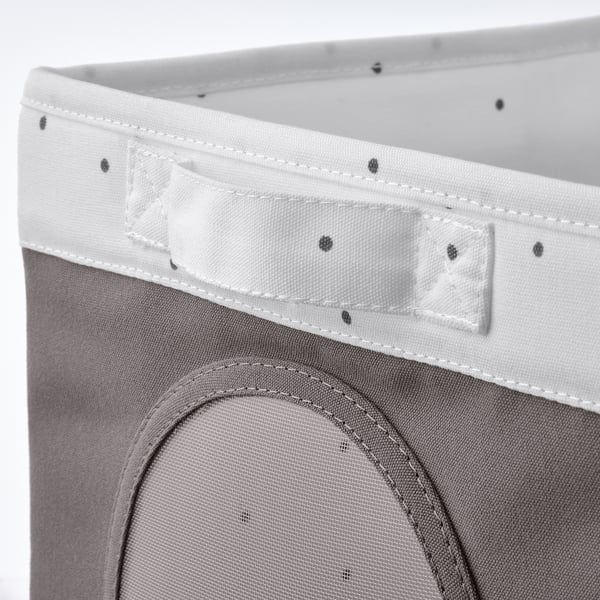 Closeup of durable, lightweight storage box made from recycled polyester. Mesh window allows viewing contents. Stitched neatly for quality.