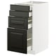 Modern black and white kitchen cabinet with bevelled edges and pull-out drawers.